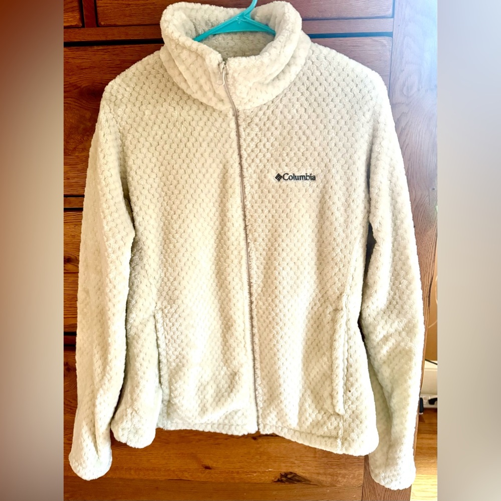 Columbia cream color fleece jacket.  Very soft. Comfy and mark.